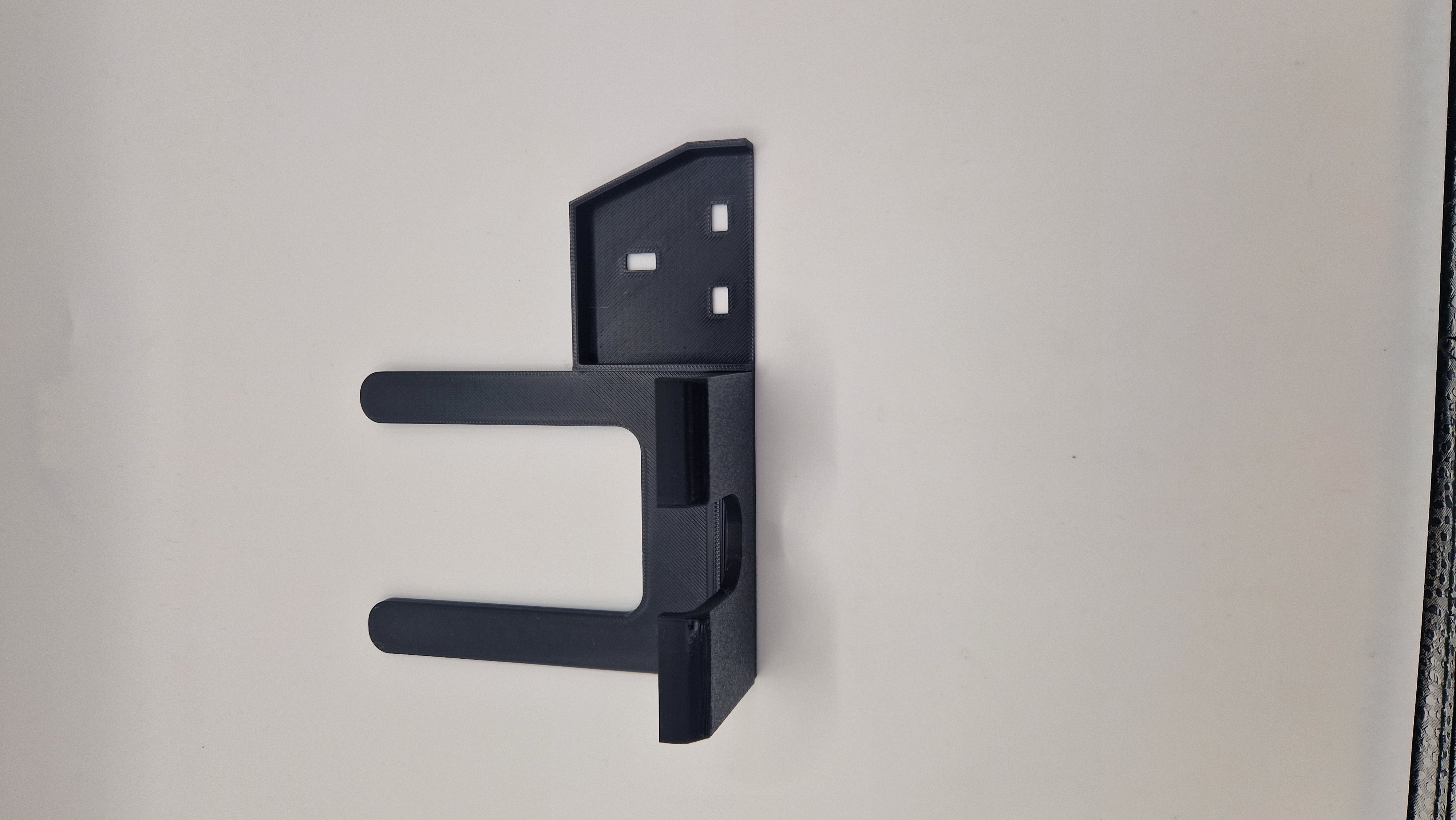 Black portrait socket phone holder with the cradle on the left